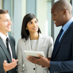 multiracial businesspeople working on tablet pc